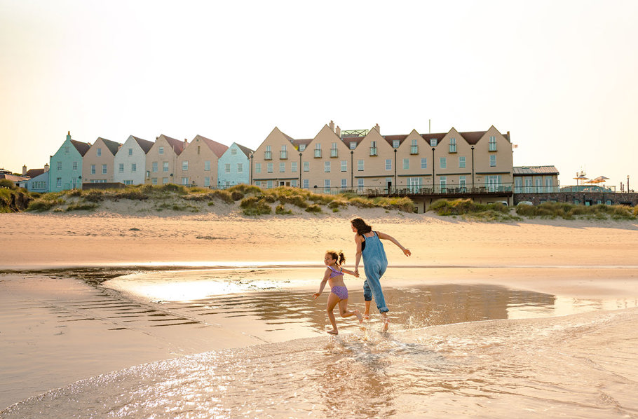 Late afternoon sun on Braye beach