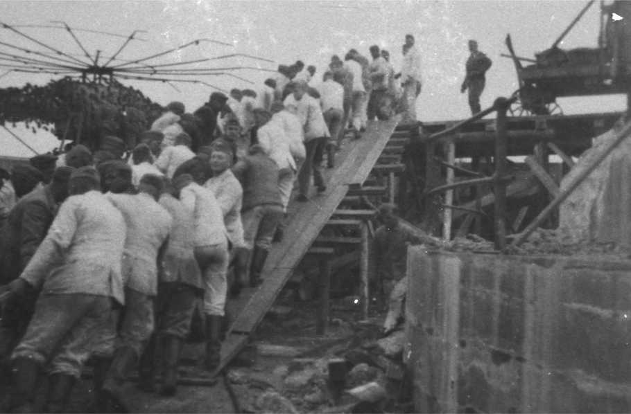 German Naval Personnel Drag The New Guns Into Position In Fort Albert. 1941